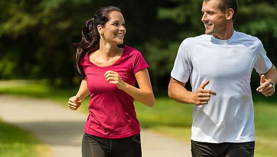 Husband and Wife out on a jog follow health advice from Boise chiropractor