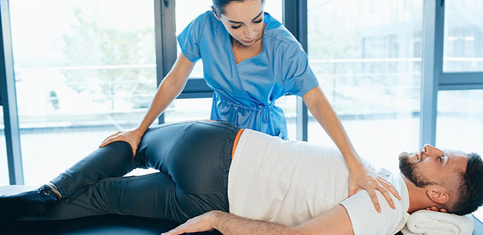 Patient receiving sciatica treatment from Boise chiropractor